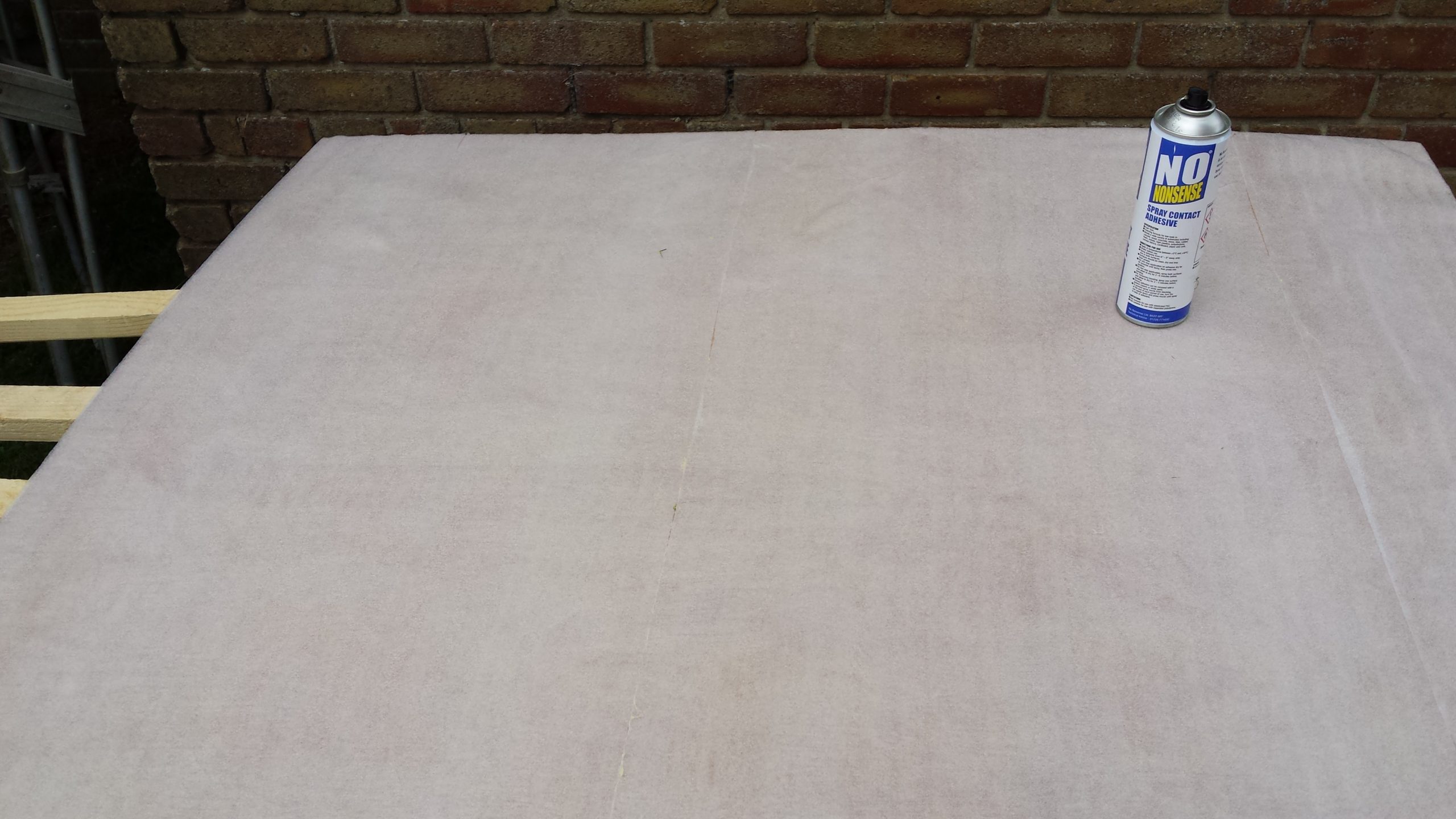 Contact spray adhesive used to apply the foam insulation.jpg